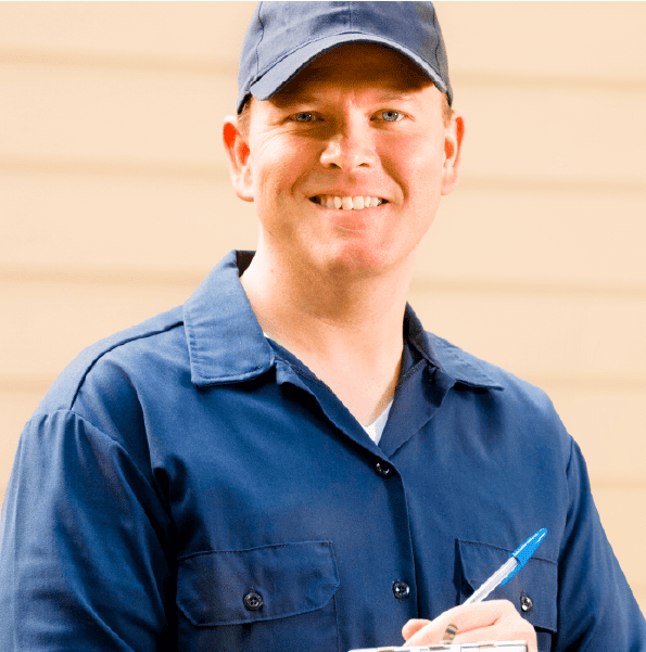EV installation technician smiling while holding pen