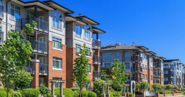 paying for multifamily utility upgrades and amenities. image depicts a modern apartment complex with updated features and electrification technologies.
