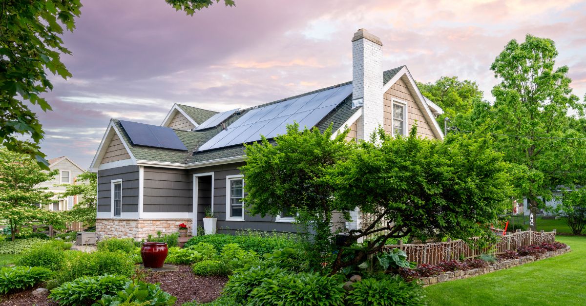 Beautiful house with solar panels, providing a preview into the future of home solar technology and answering the question, 'What is a solar panel?' in the year 2024 and beyond